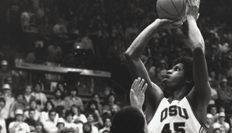 OSU basketball star A. C. Green shoots against USC, ca. 1985