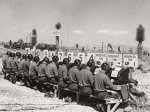U.S. Army photograph, annotated: "The 16th Signal Operations Bn provided 12 teletype machines and operators for the press at News Nob, Nevada Proving Grounds. 22 April 1952."