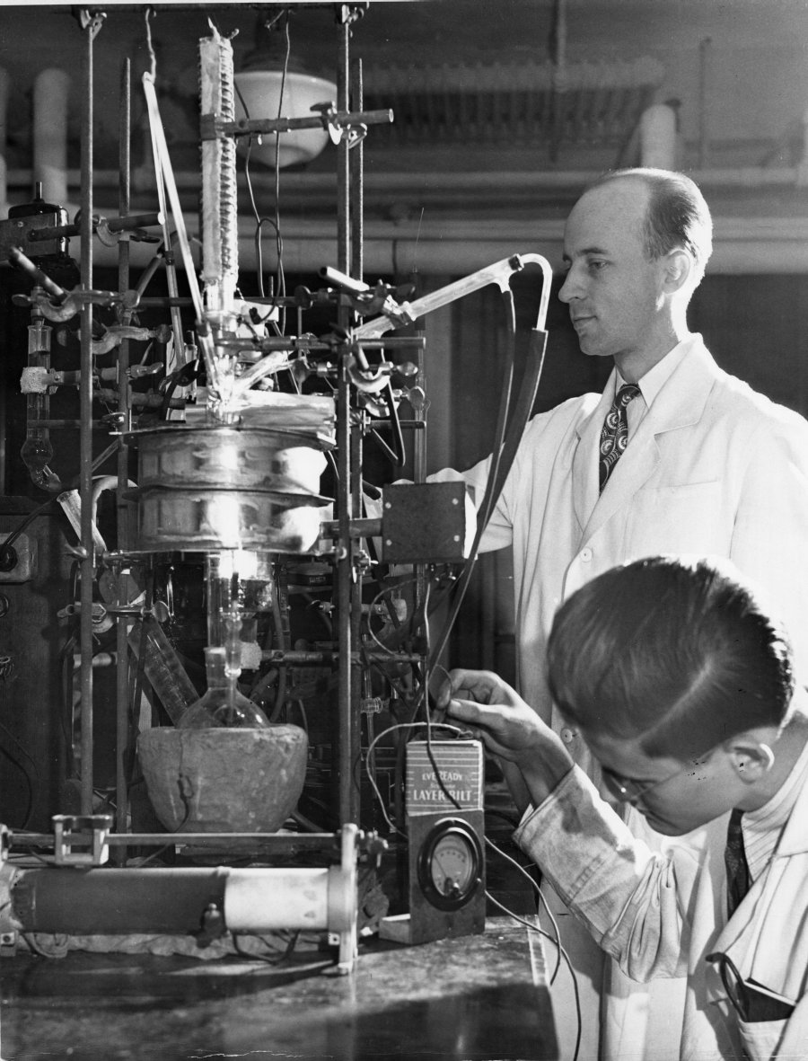 Reuben E. Wood and Richard Wallis working in a George Washington University chemistry laboratory.