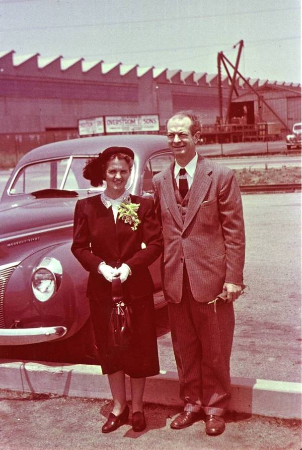 Ava Helen and Linus Pauling standing together outside [at a train station?]. Picture. 1948