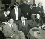 The Pauling children at a gathering in celebration of the 1954 Nobel Prizes. Stockholm, Sweden. Seated from left: Linus Pauling, Jr., Peter Pauling and Linda Pauling. Standing from left:  An unidentified individual and Crellin Pauling.