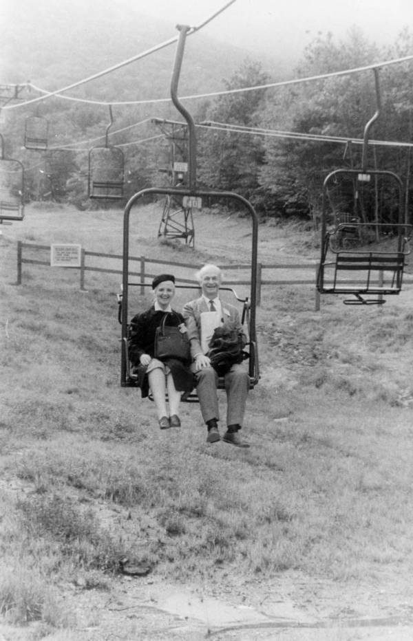 Ava Helen and Linus Pauling riding a ski lift at the seventh annual Pugwash Conference. Stowe, Vermont.