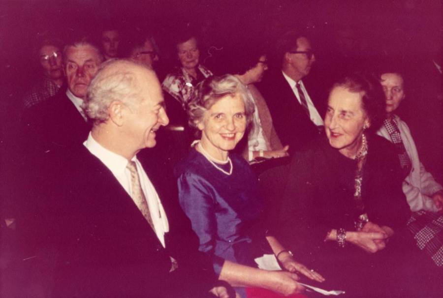 Linus and Ava Helen Pauling speaking with an unidentified woman at the Nobel Hall, Oslo, Norway.