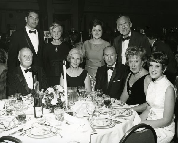Ava Helen Pauling posing with a group at the Mount Sinai Medical Center dedication and inauguration dinner, New York. Picture. October 20, 1968