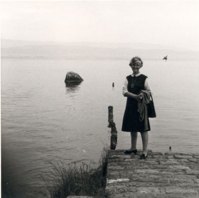 Ava Helen Pauling standing next to an unidentified body of water. Picture. 1969