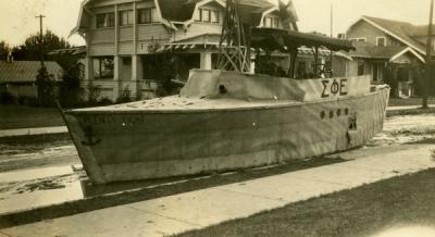 Photograph annotated: "Our prize winning float for Homecoming. Fall Term, 1927."