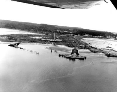 Aerial view of Newport, Oregon including Hatfield Marine Science Center and Research Vessel Yaquina, 1969.