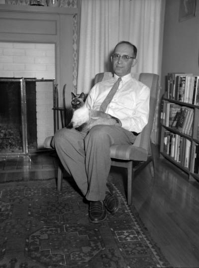 <p>Bernard Malamud sitting with a cat, ca. 1960. Malamud was an English professor at Oregon State College from 1949 to 1961. During this time he wrote three novels: The Natural (1952), The Assistant (1957), <span class='highlight2 bold'>and</span> A New Life</p><p>				(1961) as well as a collection of short stories, The Magic Barrel (1959) for which he received the National Book Award. He was presented OSU's Distinguished Service Award in 1969.</p>