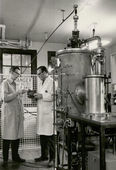 <p>Kenneth Hedberg (left), circa 1960. The machine pictured at right is an electron diffraction apparatus that Hedberg designed <span class='highlight1 bold'>and</span> built himself with the assistance of the OSC machine shop. It is still located in the</p><p>				basement of Gilbert Hall - only a handful of its kind remain worldwide.</p>