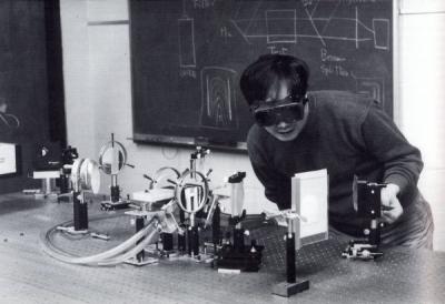 <p>Image from a mechanical engineering booklet titled "Oregon State University Mechanical Engineering - Our Faculty and Staff Heritage," October 1995. Photo caption reads "Mach-Zehner interferometric study <span class='highlight2 bold'>of</span> heat transfer</p><p>				rates for natural convection in an open channel."</p>