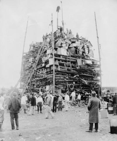 <p>Rook bonfire, 1930. For the 1930 Homecoming the rooks (freshmen) gathered fuel from all over Corvallis and built "the greatest woodpile ever hauled to the campus" on the lot between Waldo Hall <span class='highlight1 bold'>and</span> McAlexander Fieldhouse</p><p>				(near the current site of Snell Hall). The bonfire burned on the Friday night preceding Oregon State's homecoming football game against the University of Oregon. The Beavers shut out the Ducks 15-0 in that game.</p>