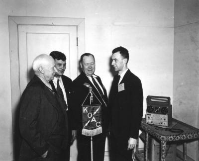 <p>New KOAC wire recorder in use at the Western Oregon Livestock Association meeting, December 1946. Pictured from left to right: R. C. Burkhart, Lebanon, retiring president of the organization; Albert Julian, Lyons, newly</p><p>				elected president; H. A. Lindgren, veteran extension animal husbandman; and Arnold Ebert, <span class='highlight0 bold'>farm</span> program director of KOAC. Lindgren served as the first president of the Steak and Chop Club.</p>