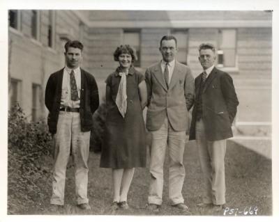 Journalism staff, 1926. From left: Webley Edwards, Eunice Rydman, A. Lowell McMillan, and John C. Burtner.