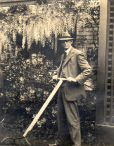 Jesse Brumbaugh doing yardwork, circa 1935.