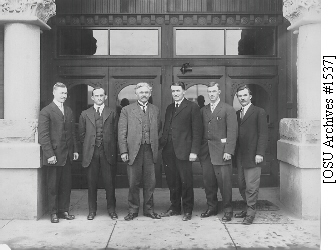 Agricultural Experiment Station Director Arthur B. Cordley and Branch Station superintendents, ca. 1915. Cordley, third from the left, became Experiment Station Director in 1914. Pictured, from left, are Harry A. Lindgren (Astor Branch Station), Ralph W. Allen (Umatilla Branch Station), Cordley, David E. Stephens (Sherman Branch Station), Leroy Breithaupt (Harney Branch Station), and Frank C. Reimer (Southern Oregon Branch Station). Not present were Robert Withycombe (Union Branch Station) and John R. Winston (Hood River Branch Station).