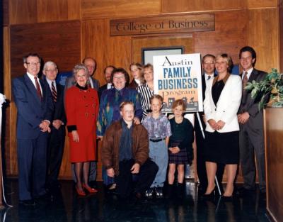 The Austin Family with President John Byrne at the dedication of the Austin Family Business Program, 1995.