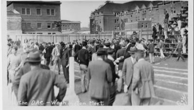 Scene from a home track meet [?] versus the University of Washington, ca. 1920s. Photo sold by Graham & Wells.