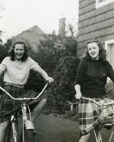 Sigma Kappa sorority members bicycling near campus, 1944.