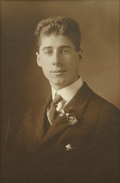 Sepia-tone studio portrait of Roger Hayward as a high school senior.