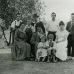 Thomas and Lena Searcy and family at farm house