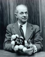 Linus Pauling, holding a model of a sulfanilamide molecule, 1954.