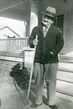 Porter outside his home. January 1958. 