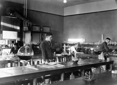 Four men in a Chemical Engineering Laboratory, ca 1920s.