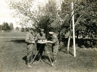 Students in a civil engineering surveying class demonstrating plane table topography, 1914.