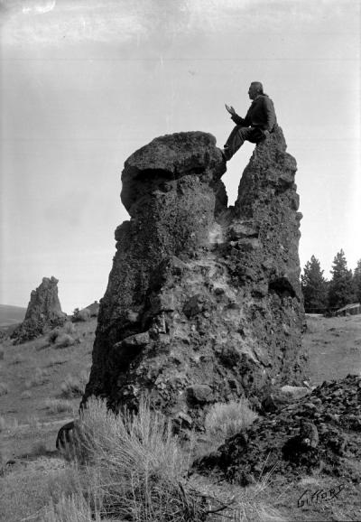 Joseph Luxello, Yakima Indian missionary, sitting on Pulpit Rock near The Dalles, Oregon, ca. 1900.