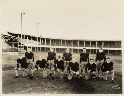 <p>The Ironmen Football team, October 1933. Front row: Charles Woodrow "Woody" Joslin, Adolph Schwammel, Clyde Devine, William Tomsheck, Harry Field, Victor Curtin. Back row: Vernon Wedin, Harold Joslin, Norman "Red"</p><p>				Franklin, James "Pierre" Bowman, Harold Pangle.</p>