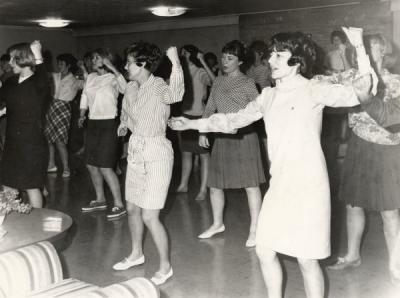 Chi Omegas at the Inter-fraternity Council Sing practice, ca. 1960s.