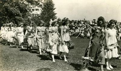 A scene of maypole dancing. Original image is annotated: "OAC dancing of folk dances by college girls," ca early 1900s.