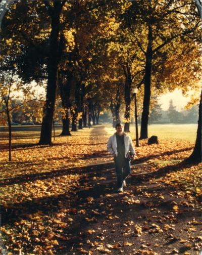 Unidentified student walking on the east end of the OSU campus, ca. 1990.