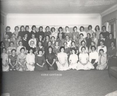 Mother's Weekend group portrait at the Co-ed Cottage, 1961. Darlene Olson (now Darlene Hooley) stands in the top row, right. Hooley graduated from Oregon State University in 1962.