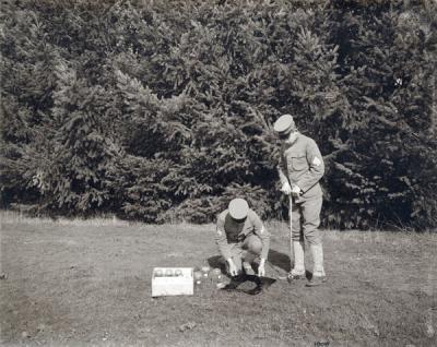 Students taking soil samples using a wire basket test, ca. 1909.