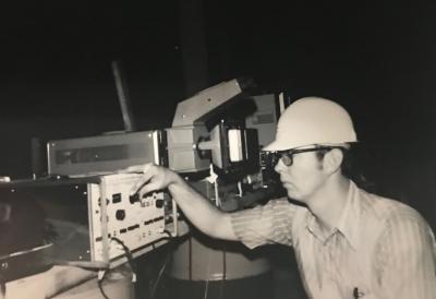 Zigler examining reactor equipment, 1973