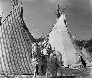 A Native American child on horseback at the Pendleton Round-Up, ca. 1940.