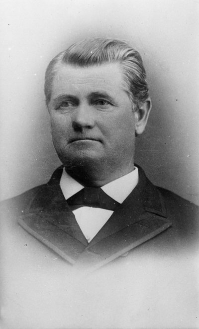 Black and white photographic portrait of Joseph Emery.